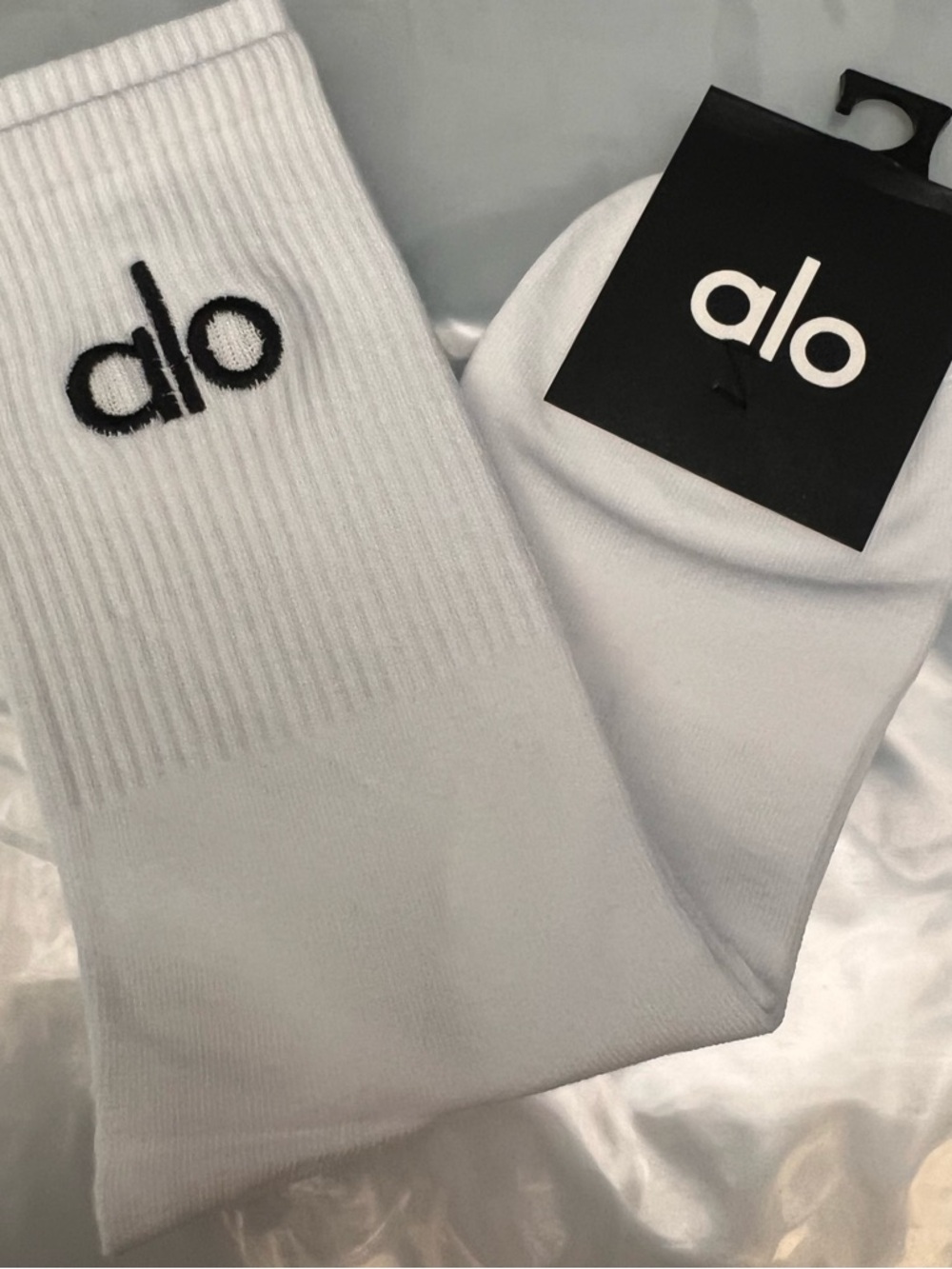ALO Yoga unisex half crew understated socks in gray embroidered logo